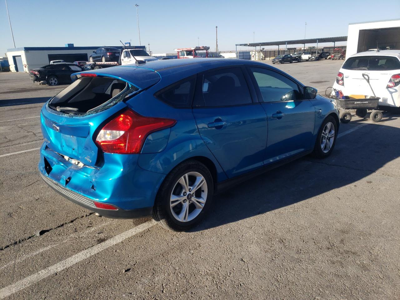 Photo 4 from auction – 2014 FORD FOCUS SE with VIN 1FADP3K22EL197732