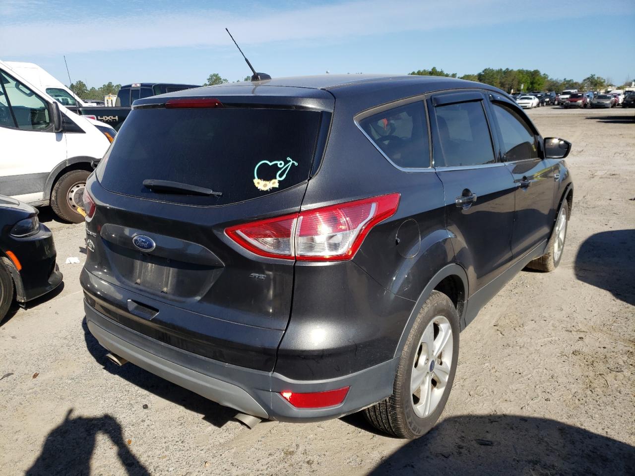 Photo 4 from auction – 2016 FORD ESCAPE SE with VIN 1FMCU0G73GUC74098