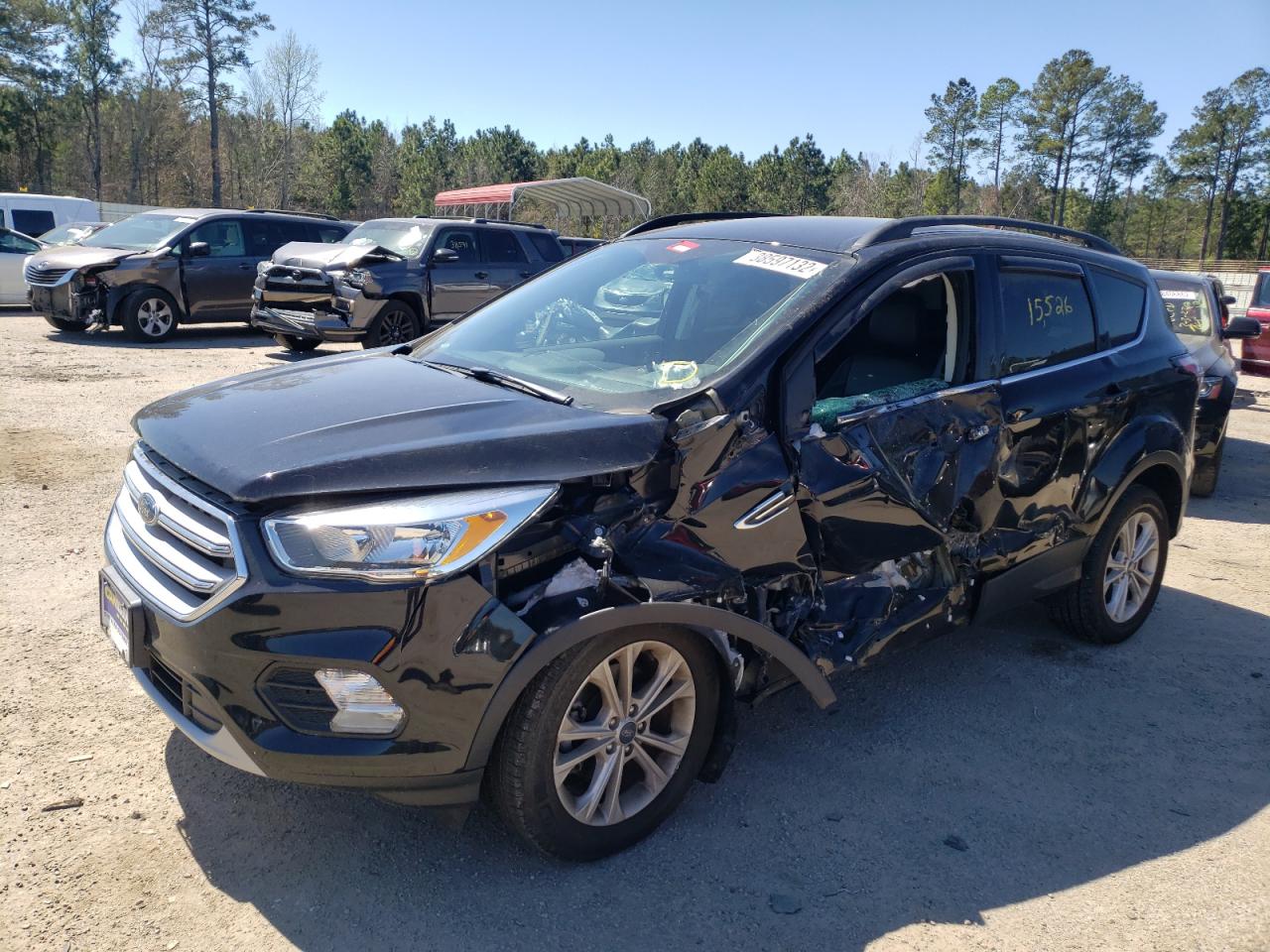 Photo 2 from auction – 2018 FORD ESCAPE SE with VIN 1FMCU0GDXJUB19562
