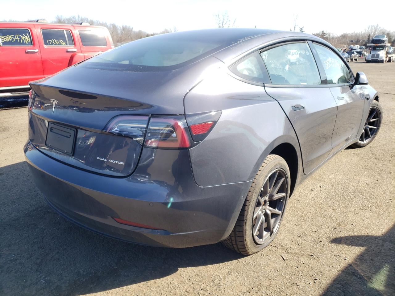 Photo 4 from auction – 2021 TESLA MODEL 3 with VIN 5YJ3E1EB1MF048497