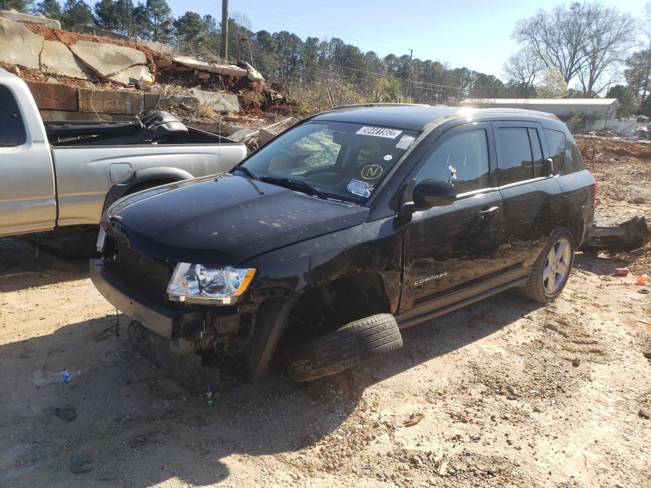 Photo 2 from auction – 2014 JEEP COMPASS LA with VIN 1C4NJCEAXED666577