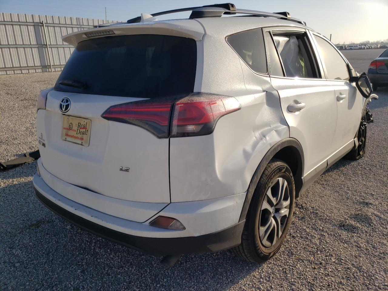 Photo 4 from auction – 2017 TOYOTA RAV4 LE with VIN JTMZFREV7HJ716334