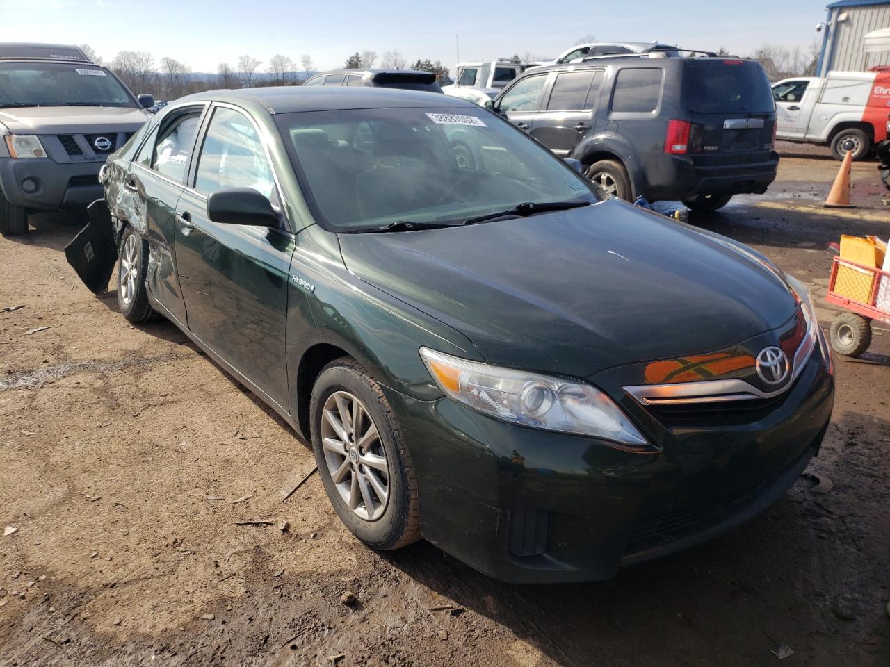 TOYOTA CAMRY HYBR 2011 with VIN 4T1BB3EK3BU142249 - Photo from auction