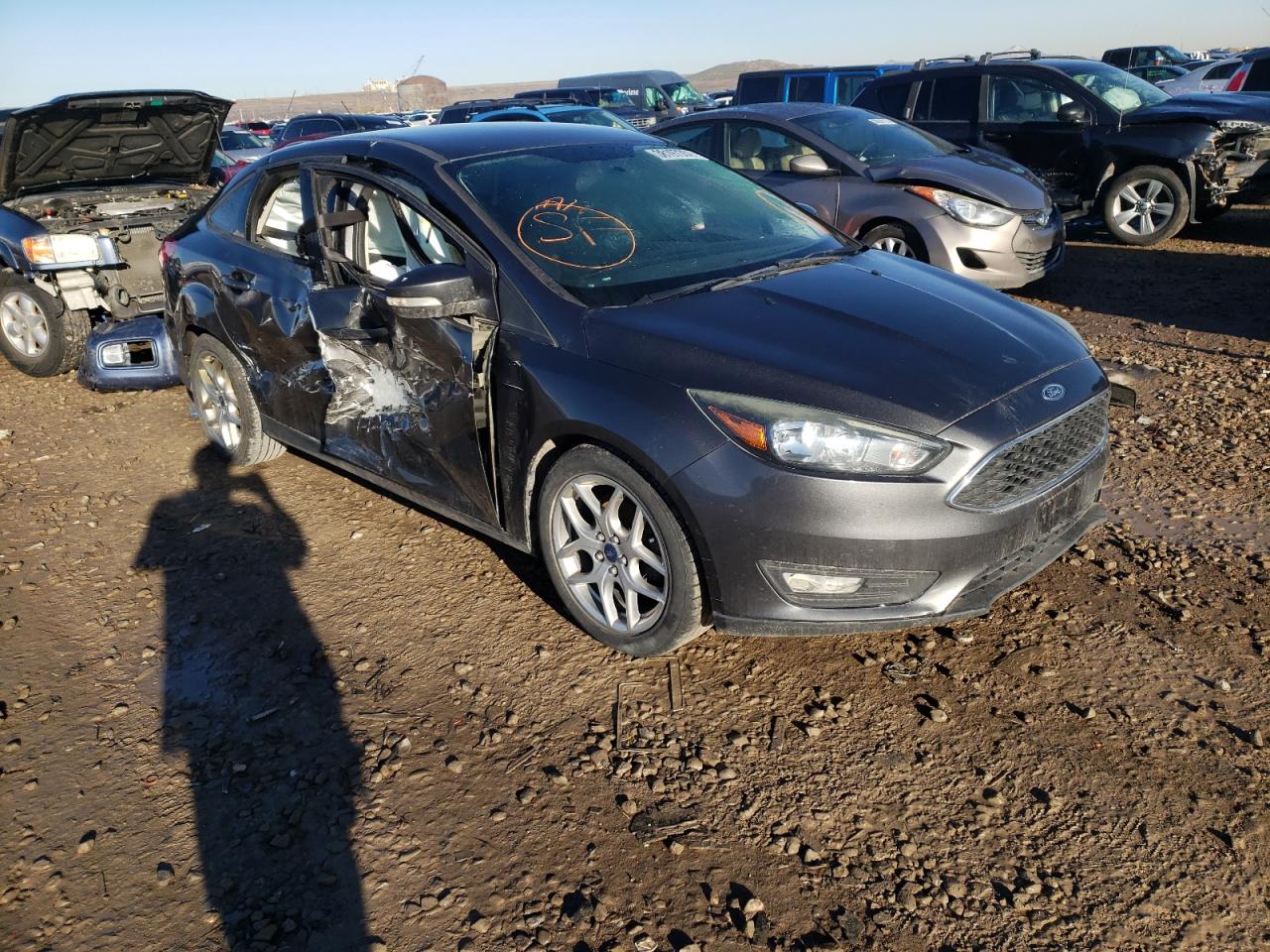 FORD FOCUS SE 2015 with VIN 1FADP3F25FL232128 - Photo from auction