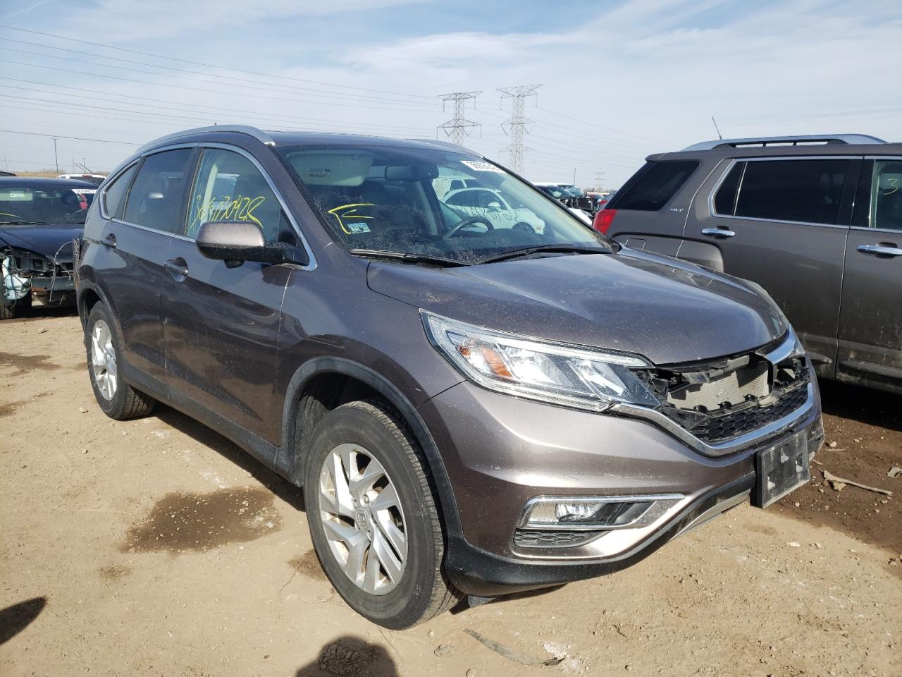 Photo 1 from auction – 2015 HONDA CR-V EXL with VIN 5J6RM4H79FL037053
