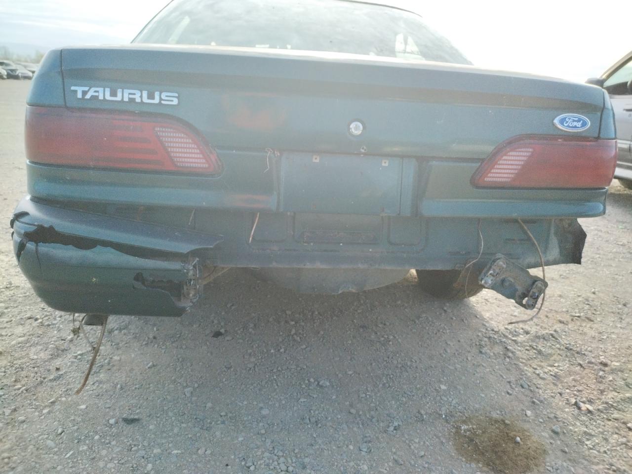 Photo 9 from auction – 1994 FORD TAURUS GL with VIN 1FALP5249RG104003