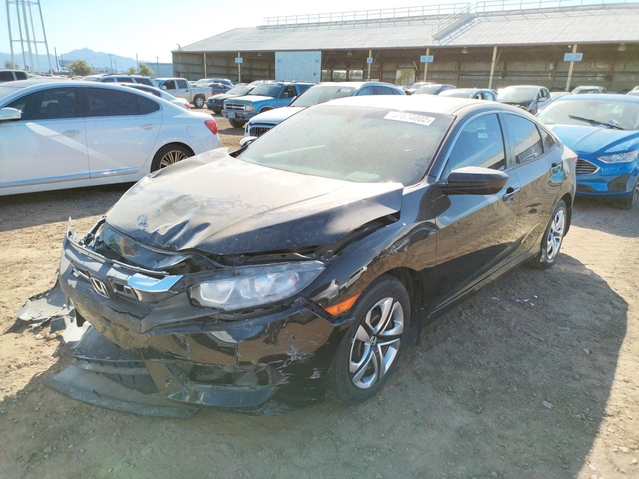 Photo 2 from auction – 2018 HONDA CIVIC LX with VIN 2HGFC2F59JH578452