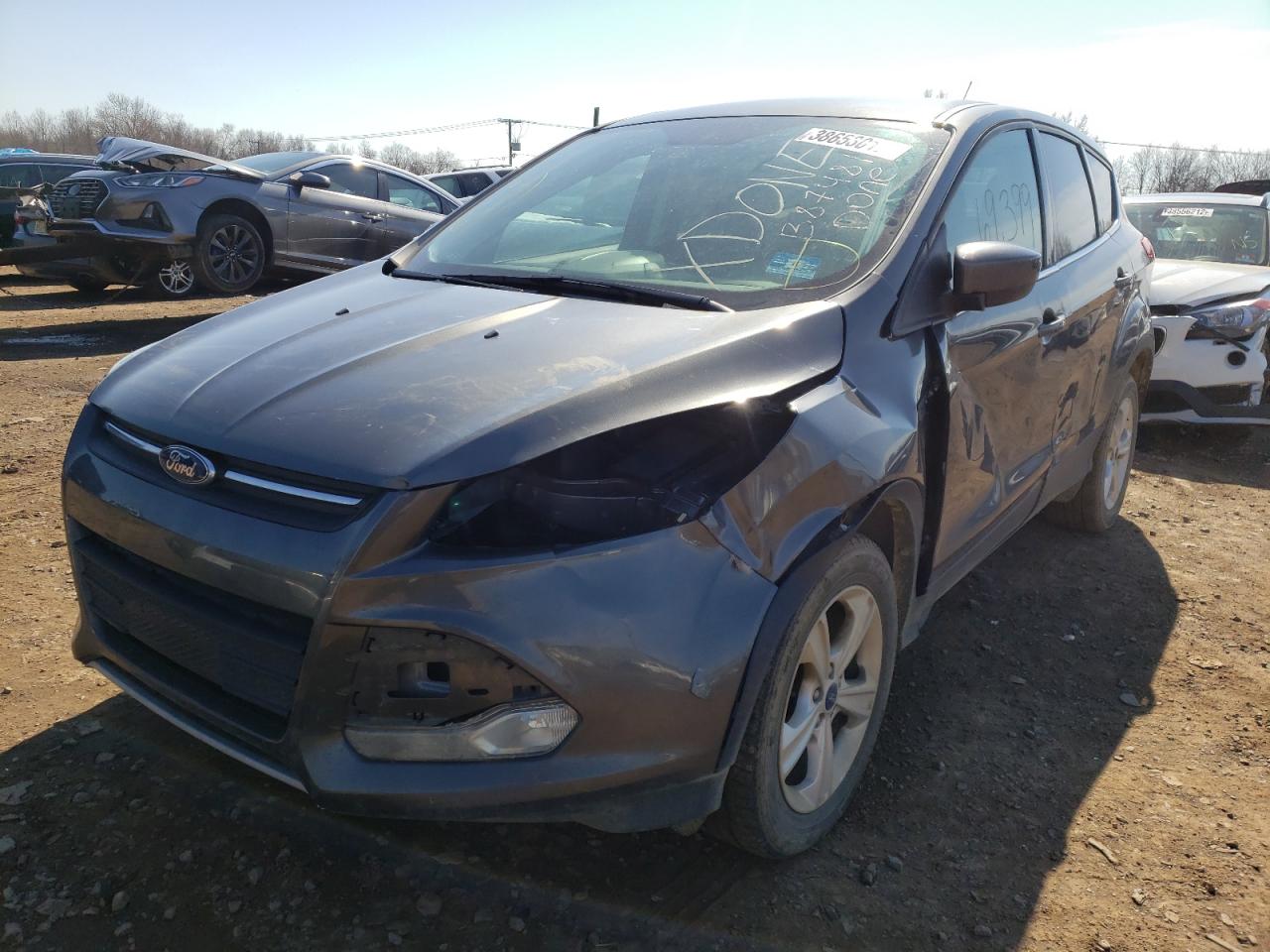 Photo 2 from auction – 2015 FORD ESCAPE SE with VIN 1FMCU0G77FUB87481