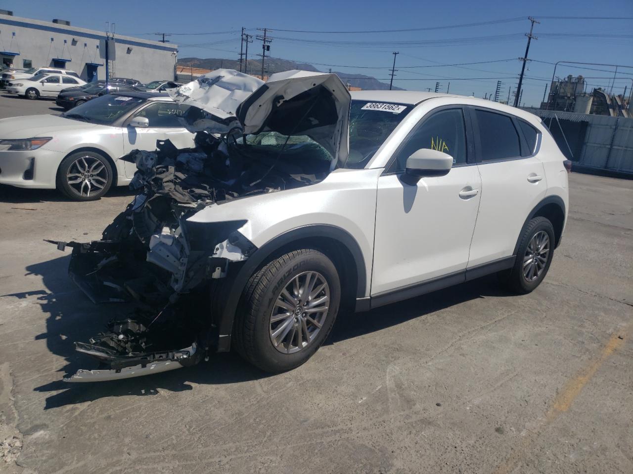 Photo 2 from auction – 2018 MAZDA CX-5 SPORT with VIN JM3KFABM9J1474044