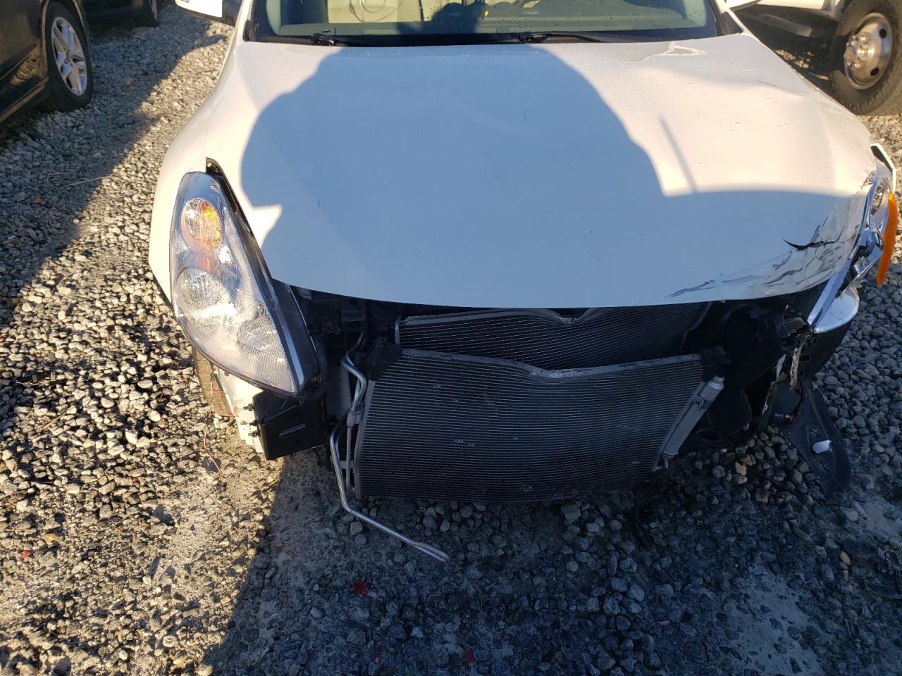 Photo 9 from auction – 2011 NISSAN ALTIMA SR with VIN 1N4BL2AP1BC158894
