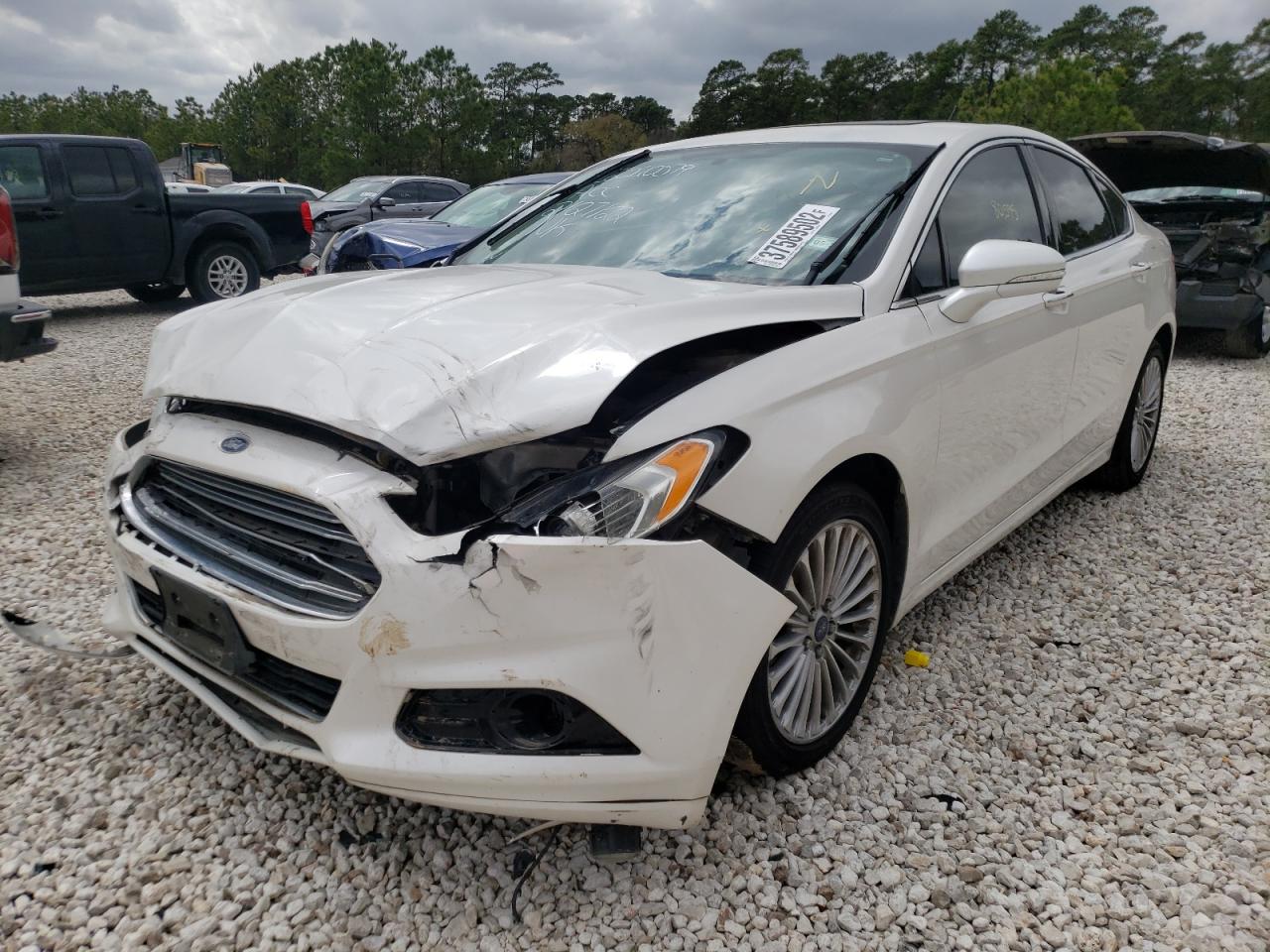Photo 2 from auction – 2014 FORD FUSION TIT with VIN 3FA6P0K96ER226610