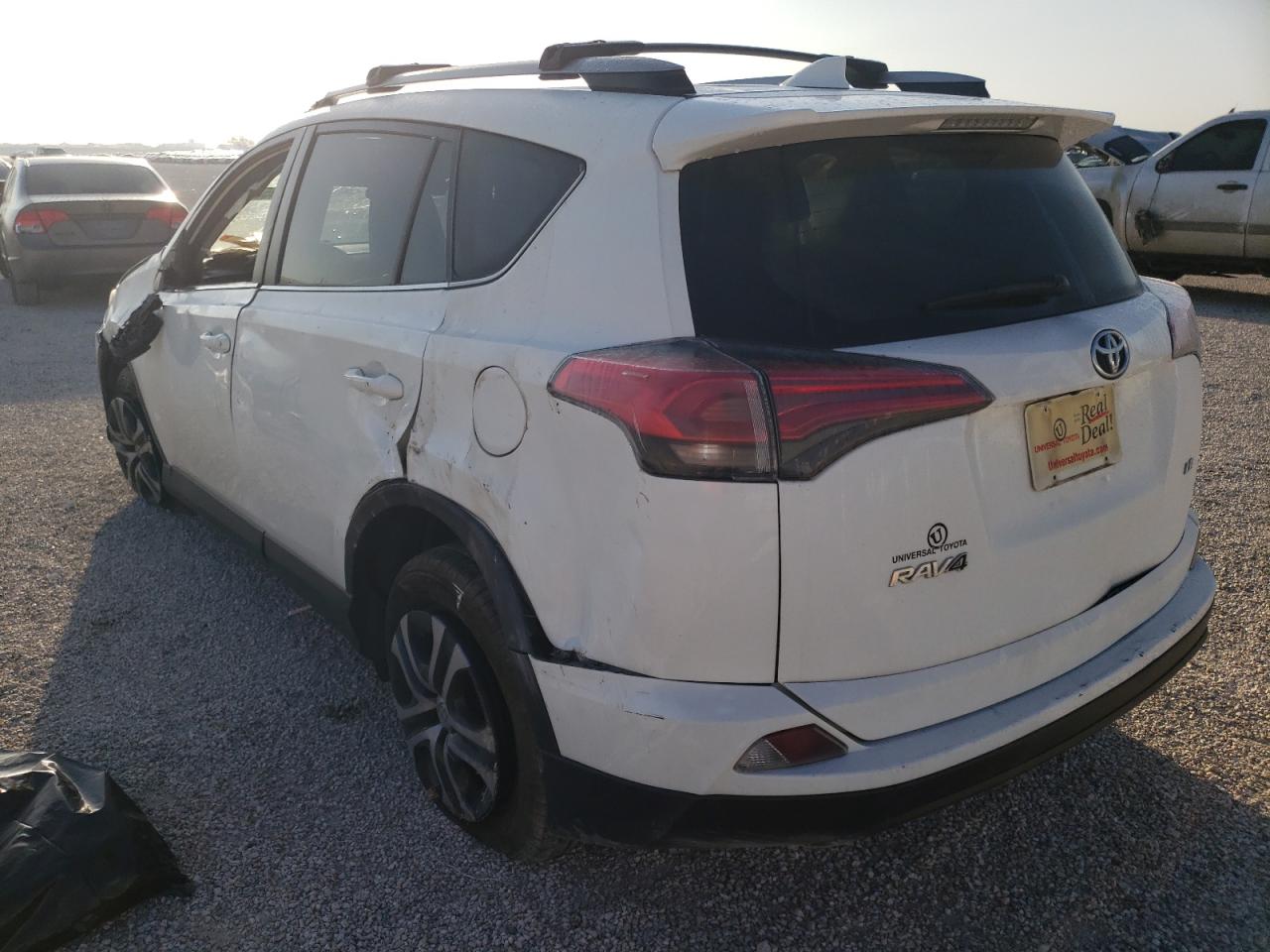 Photo 3 from auction – 2017 TOYOTA RAV4 LE with VIN JTMZFREV7HJ716334