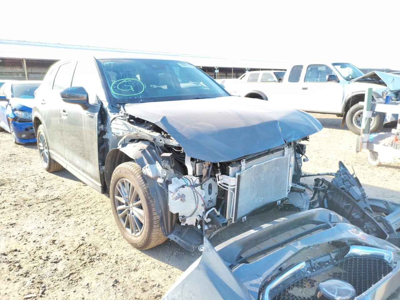 Photo 9 from auction – 2021 MAZDA CX-5 TOURI with VIN JM3KFACM1M1315909