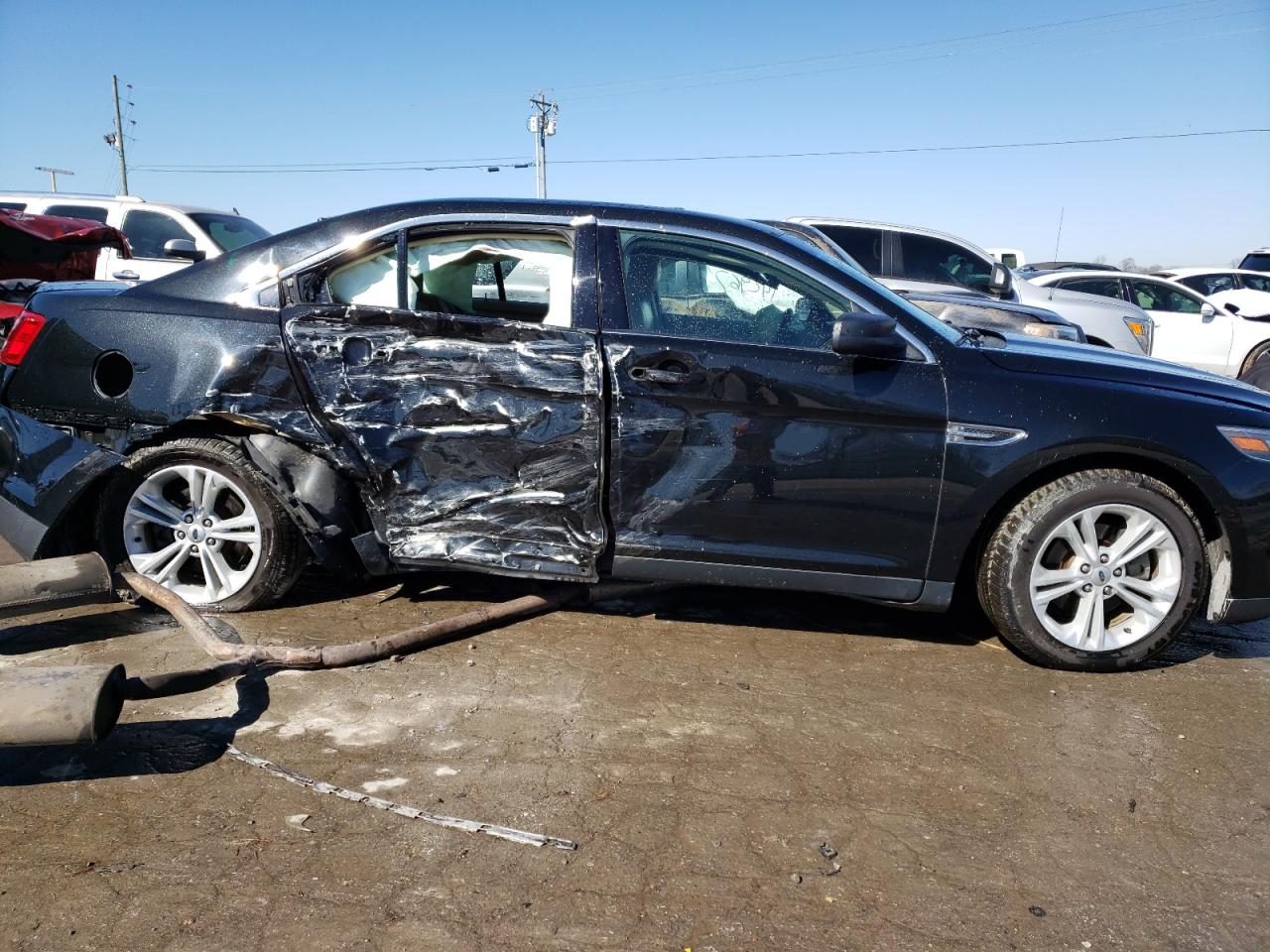 Photo 9 from auction – 2015 FORD TAURUS SE with VIN 1FAHP2D84FG199361