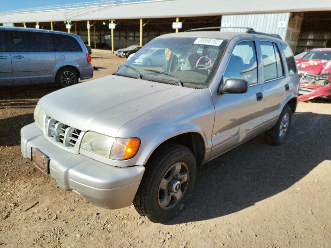 Photo 2 from auction – 2001 KIA SPORTAGE with VIN KNDJA723515690219