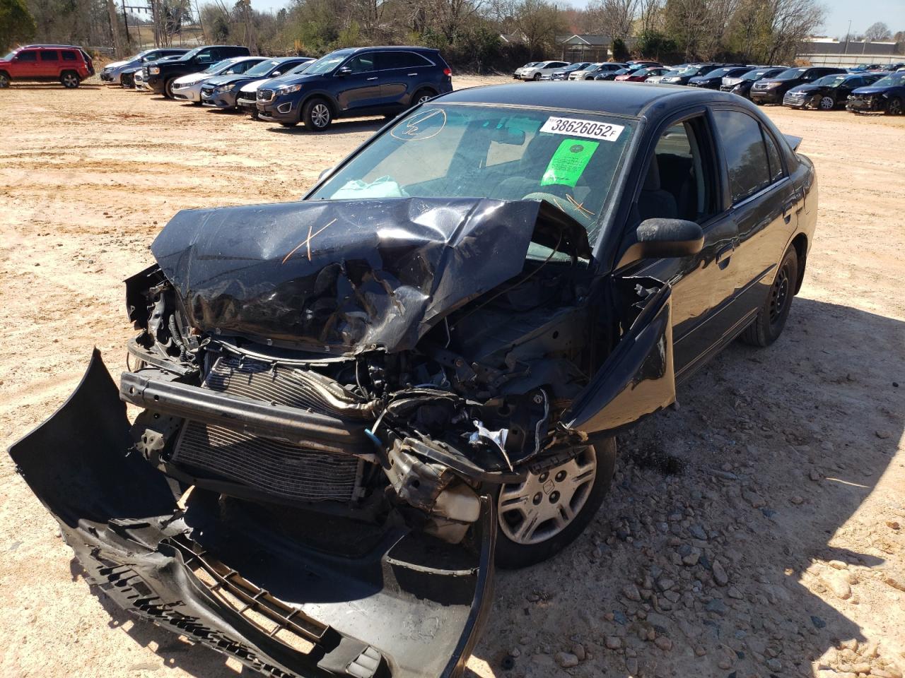 Photo 2 from auction – 2002 HONDA CIVIC LX with VIN 1HGES16592L050231