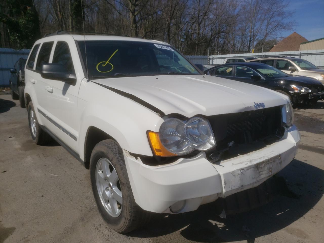 JEEP GRAND CHER 2010 with VIN 1J4PR4GK9AC127374 - Photo from auction