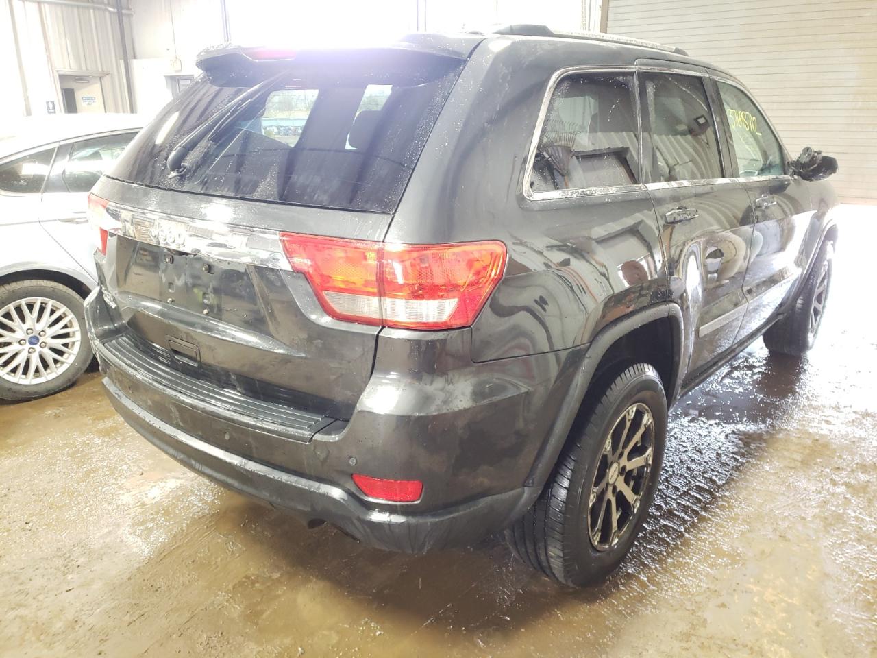 Photo 4 from auction – 2011 JEEP GRAND CHER with VIN 1J4RR4GG6BC641768