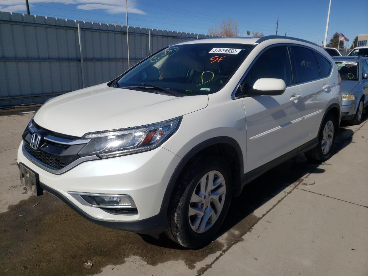 Photo 2 from auction – 2016 HONDA CR-V EXL with VIN 5J6RM4H76GL009583