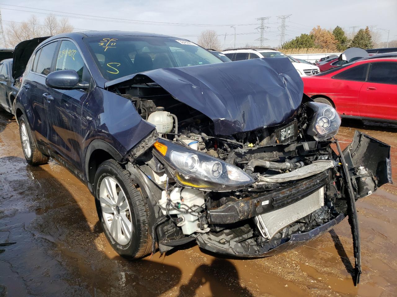 KIA SPORTAGE L 2018 with VIN KNDPMCAC3J7385074 - Photo from auction