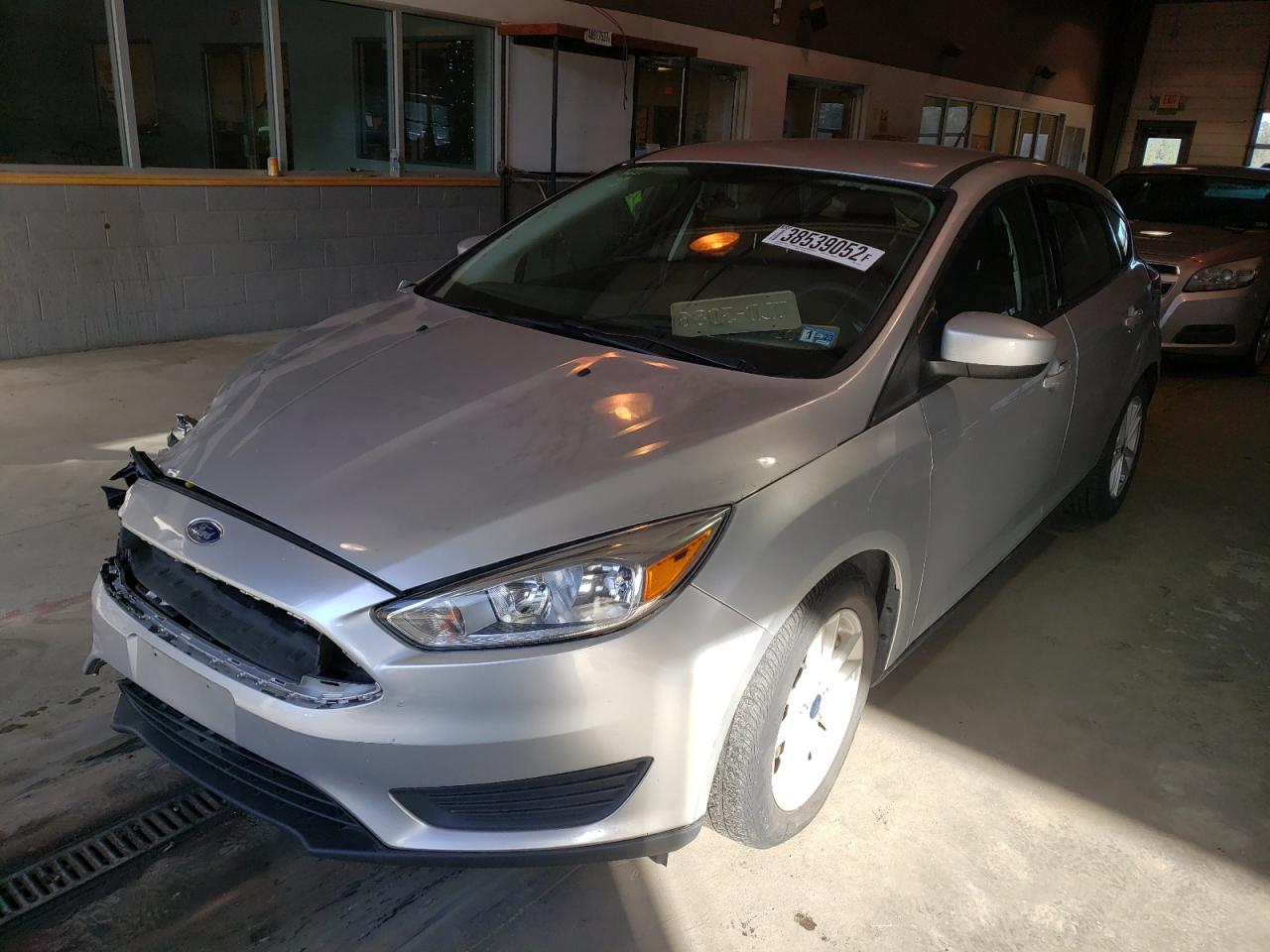 Photo 2 from auction – 2018 FORD FOCUS SE with VIN 1FADP3K27JL231481