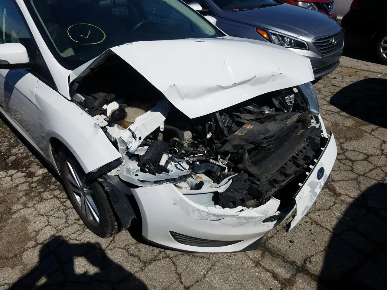 Photo 9 from auction – 2016 FORD FOCUS SE with VIN 1FADP3K27GL291236