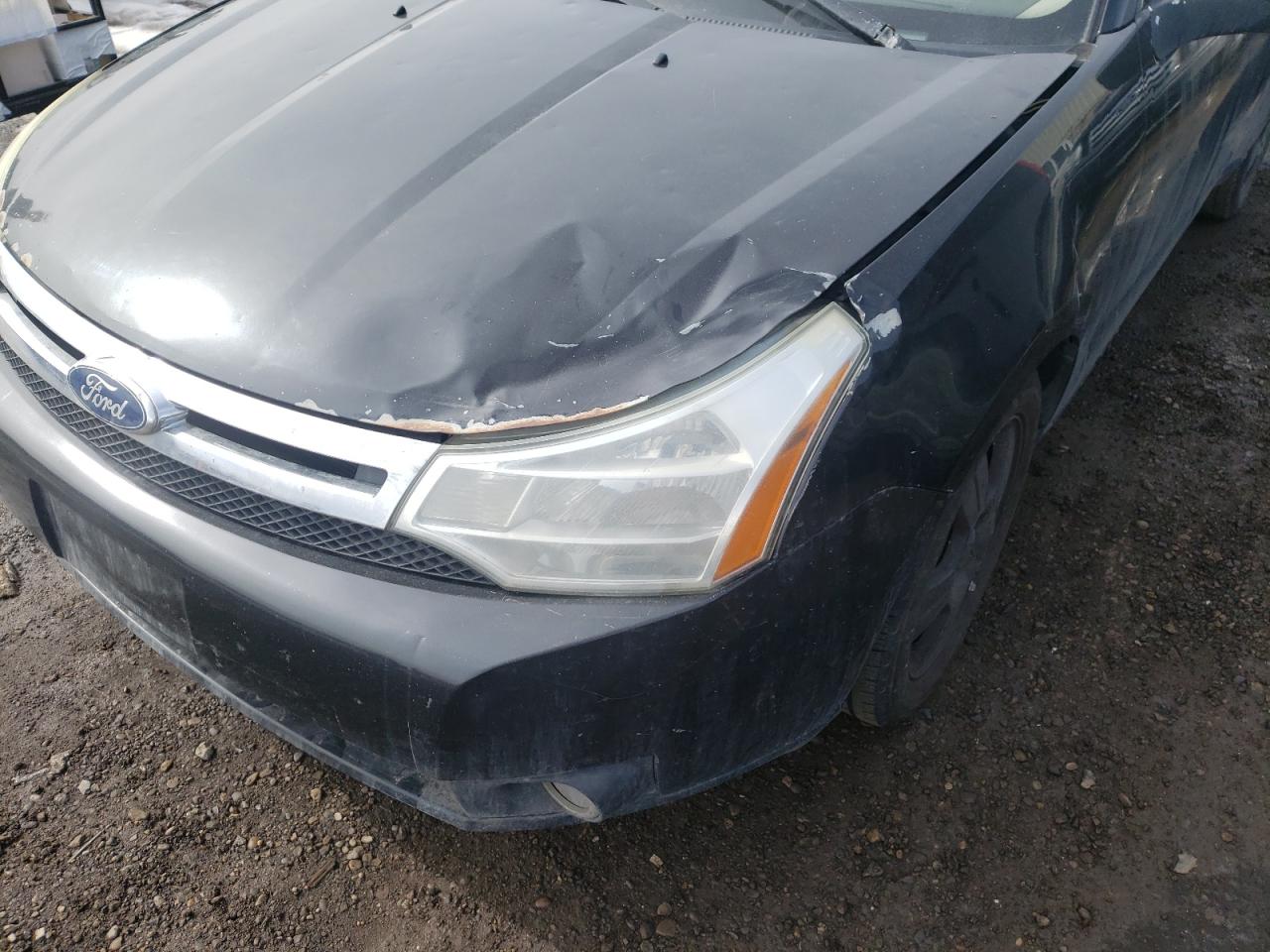 Photo 9 from auction – 2011 FORD FOCUS with VIN 1FAHP3FN0BW138730