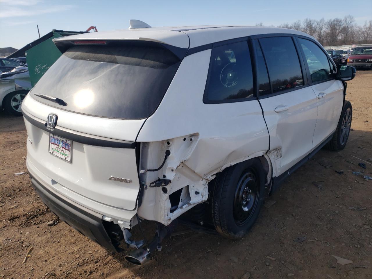 Photo 4 from auction – 2021 HONDA PASSPORT E with VIN 5FNYF8H55MB008733