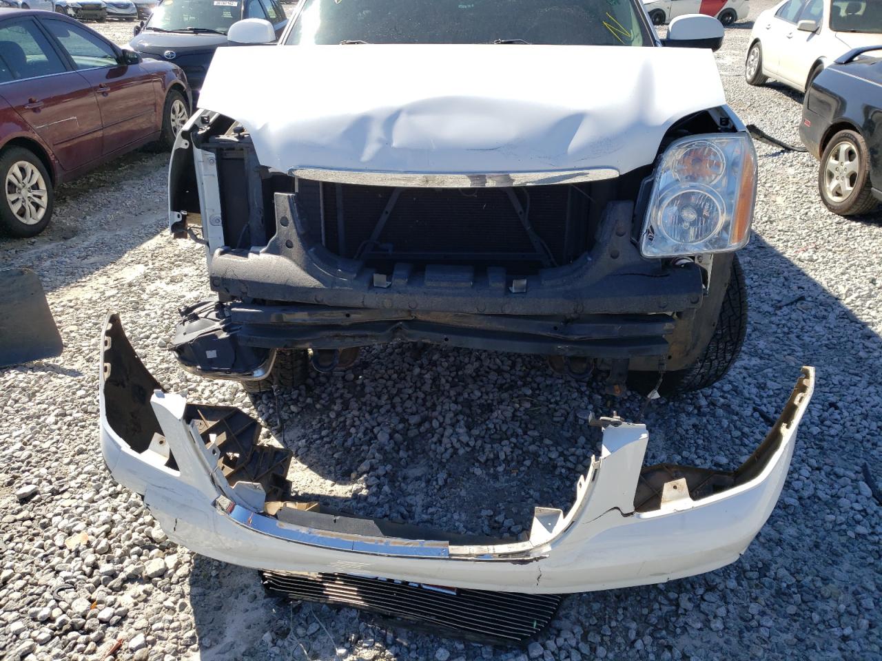 Photo 9 from auction – 2009 GMC YUKON SLE with VIN 1GKFC23059R132631