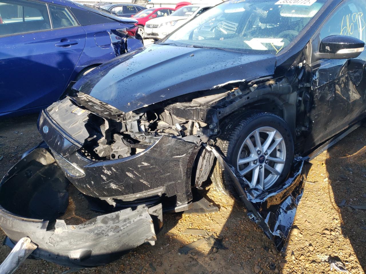 Photo 9 from auction – 2016 FORD FOCUS SE with VIN 1FADP3F23GL238236