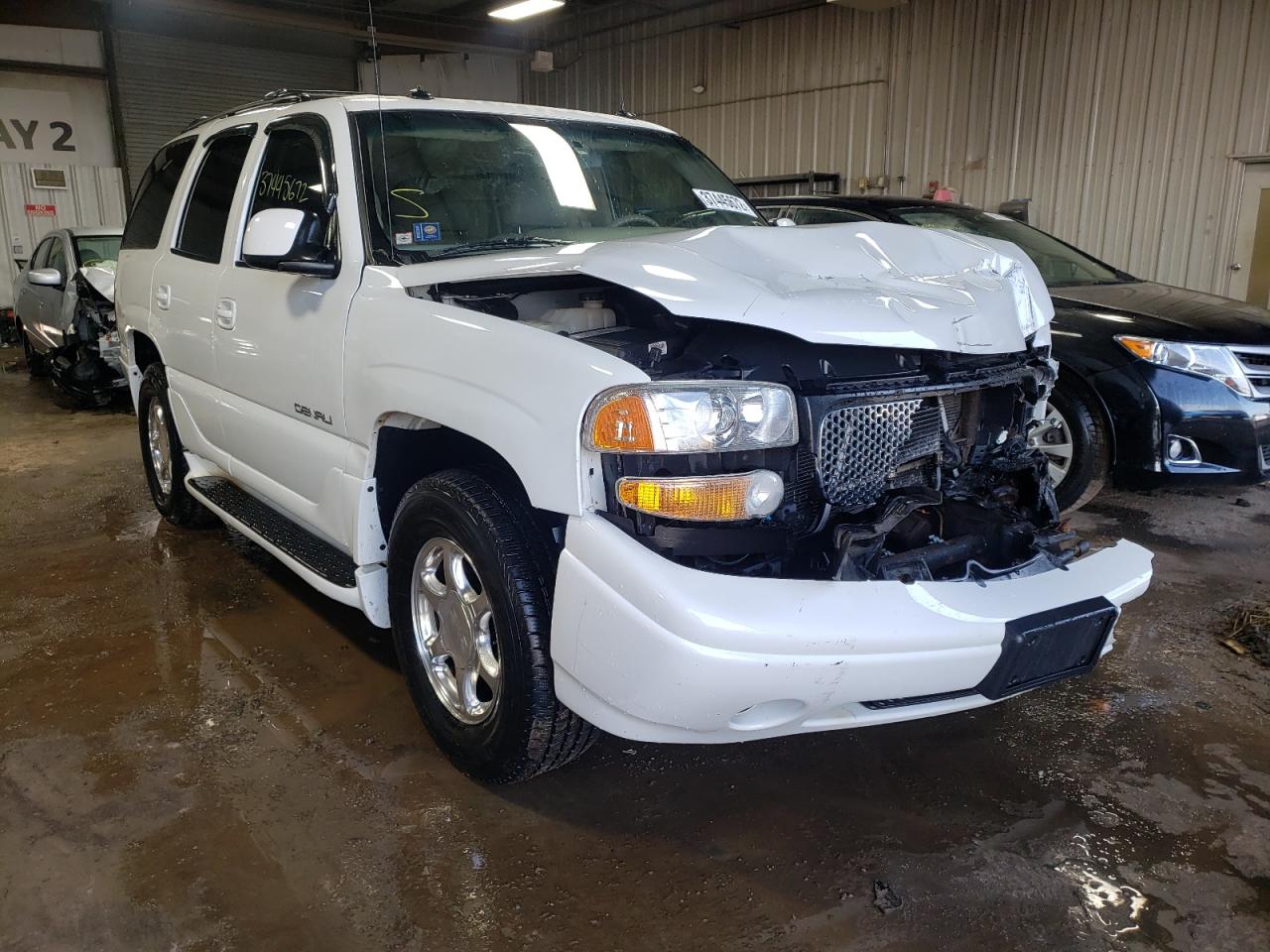 GMC YUKON DENA 2003 with VIN 1GKEK63U33J248425 - Photo from auction
