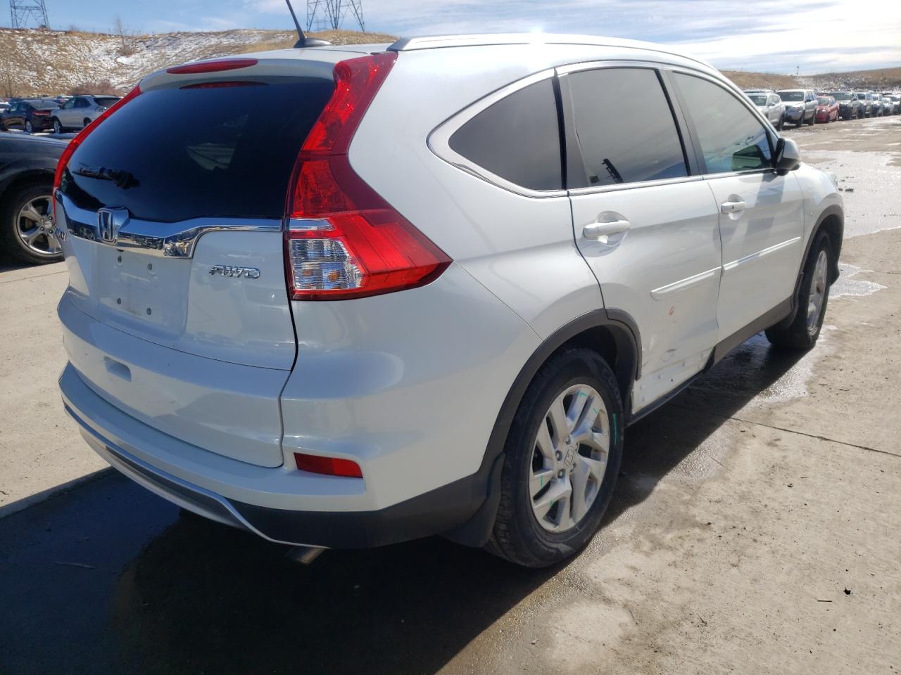 Photo 4 from auction – 2016 HONDA CR-V EXL with VIN 5J6RM4H76GL009583