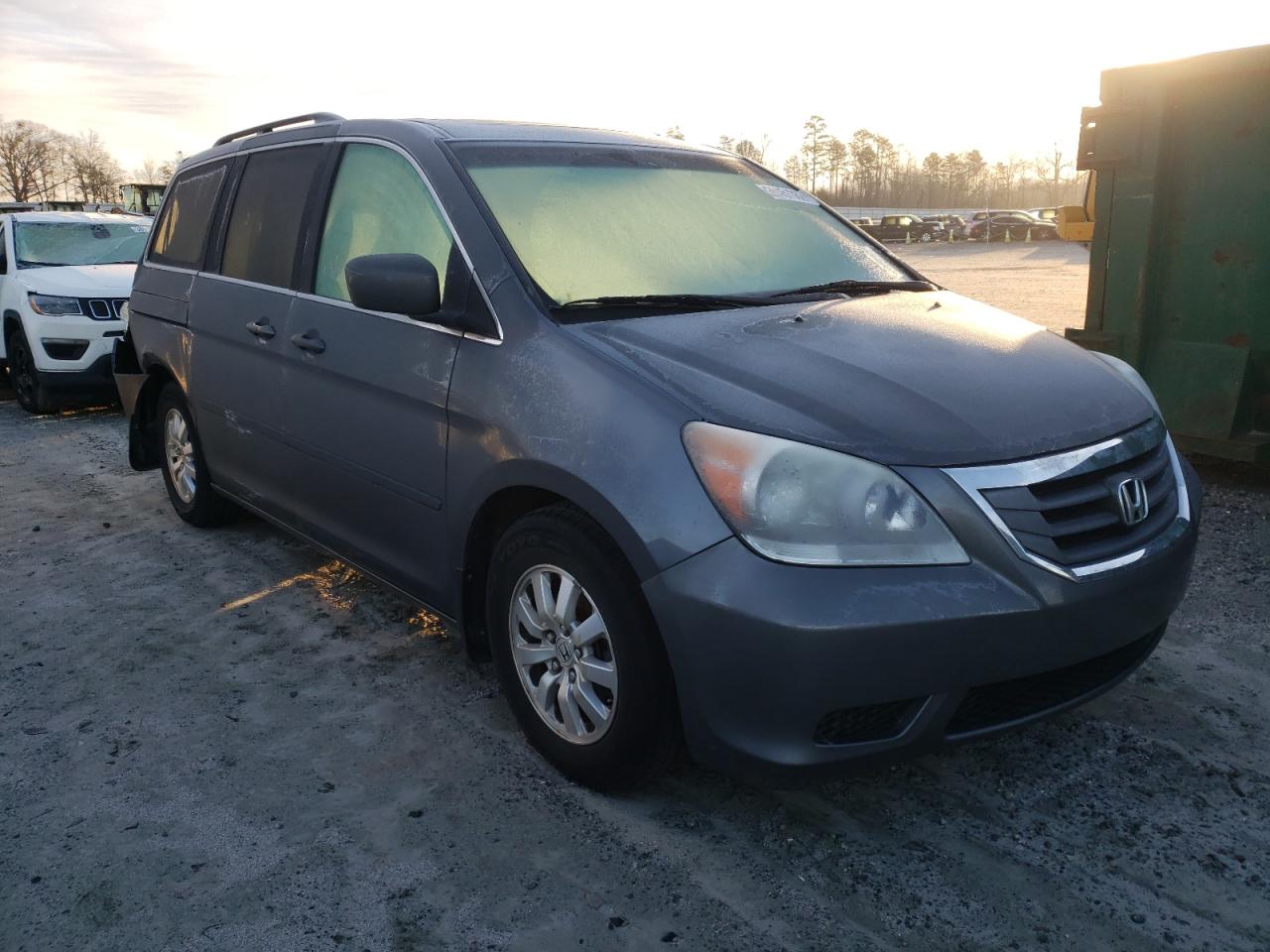 HONDA ODYSSEY EX 2010 with VIN 5FNRL3H78AB098635 - Photo from auction