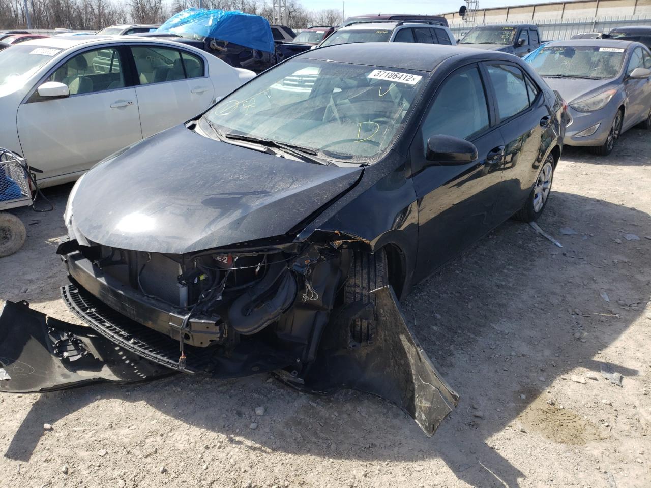 Photo 2 from auction – 2014 TOYOTA COROLLA L with VIN 2T1BURHE9EC052080