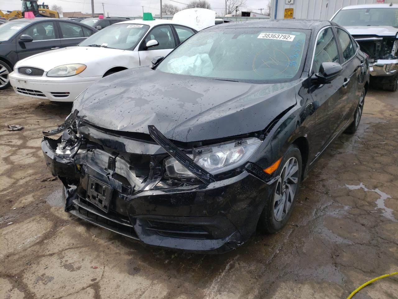 Photo 2 from auction – 2018 HONDA CIVIC EX with VIN 19XFC2F79JE037980