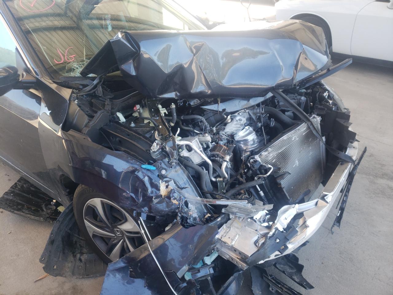 Photo 9 from auction – 2019 HONDA CIVIC LX with VIN 19XFC2F67KE012987