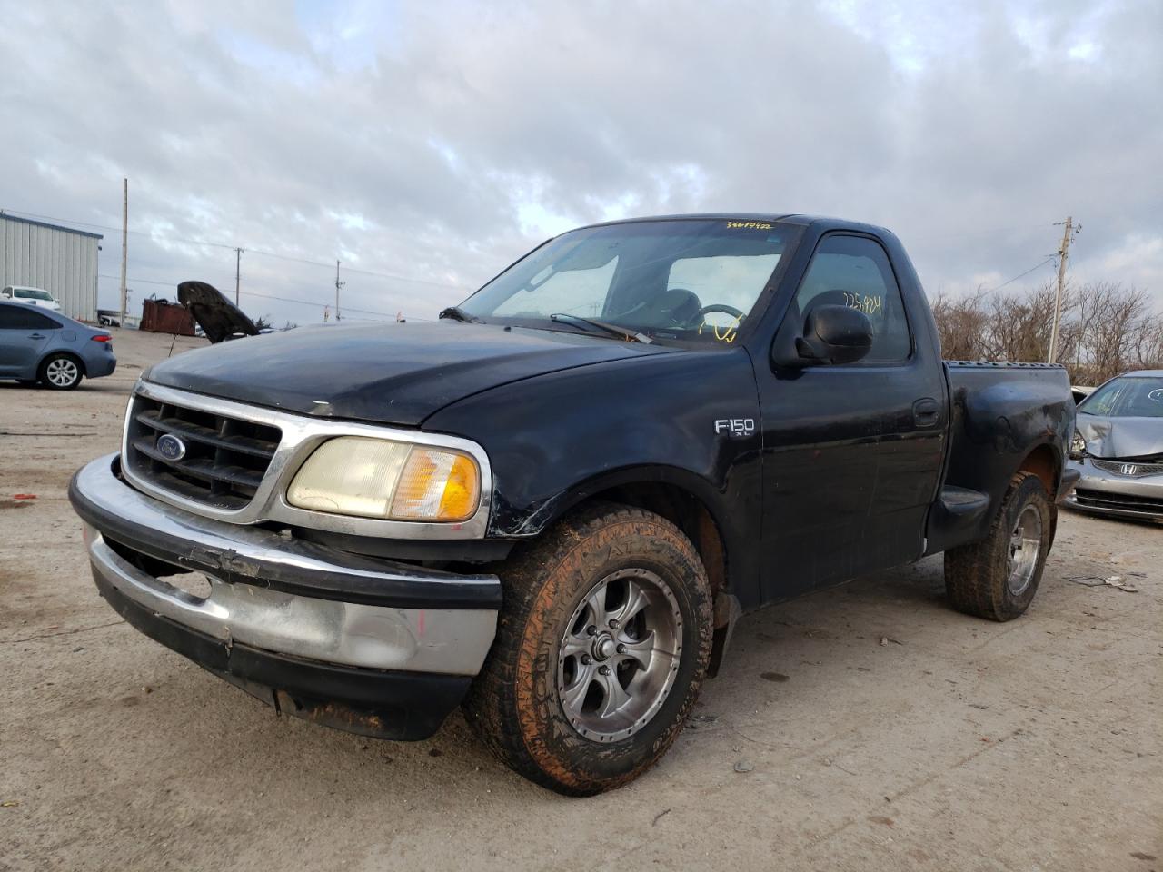 Photo 2 from auction – 2003 FORD F150 with VIN 1FTRF07253KC67107