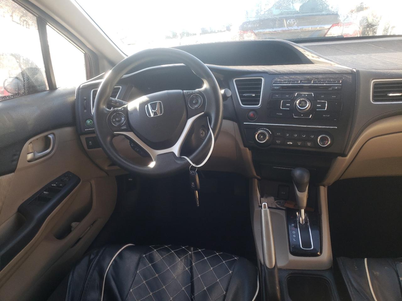 Photo 9 from auction – 2014 HONDA CIVIC LX with VIN 2HGFB2F54EH516241