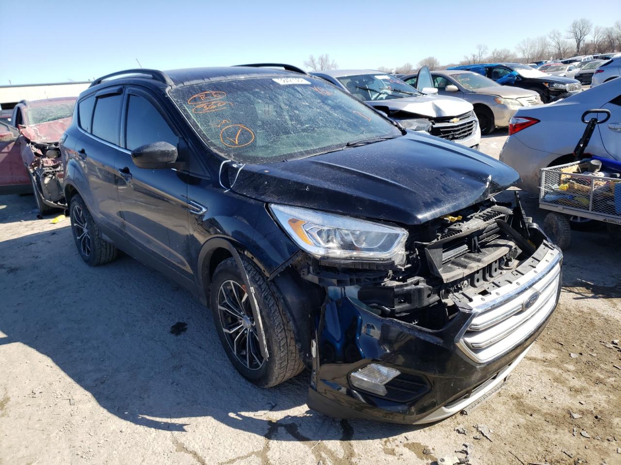 FORD ESCAPE SE 2017 with VIN 1FMCU9G95HUD96369 - Photo from auction