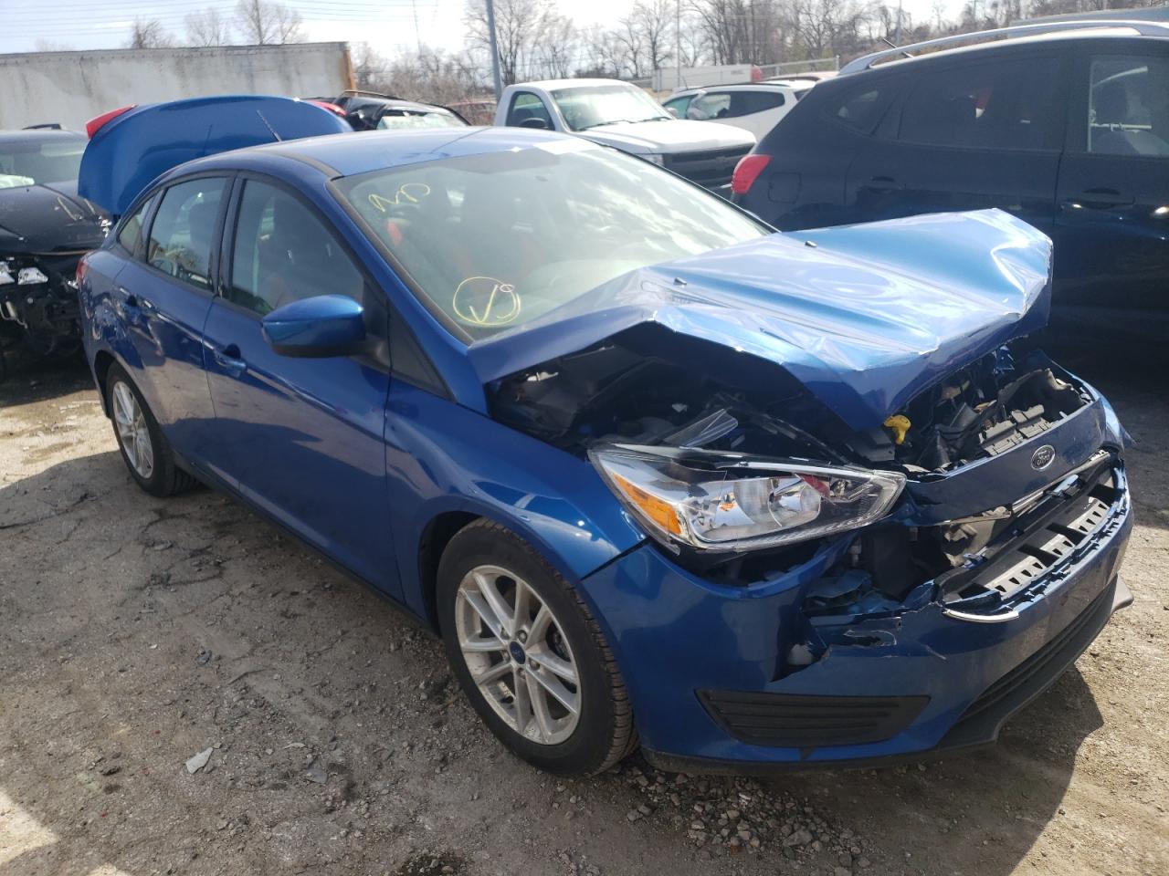 FORD FOCUS SE 2018 with VIN 1FADP3FE7JL259902 - Photo from auction