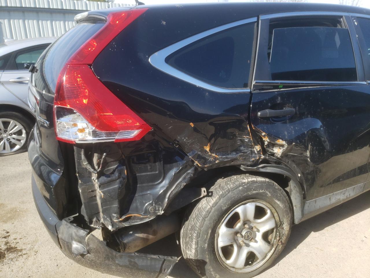 Photo 9 from auction – 2012 HONDA CR-V LX with VIN 2HKRM4H39CH629362