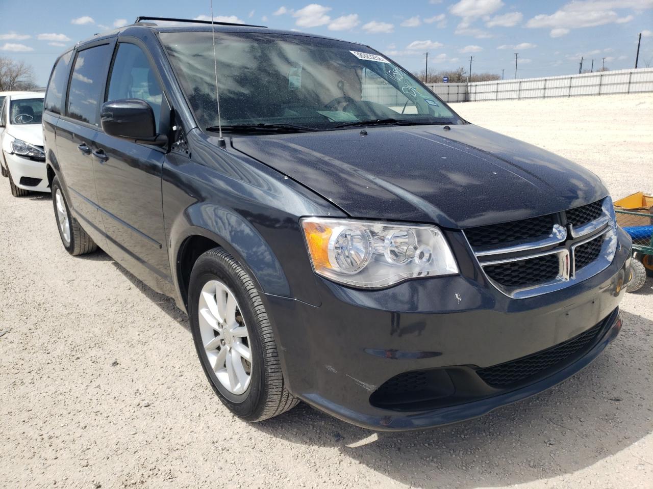 DODGE GRAND CARA 2014 with VIN 2C4RDGCGXER128062 - Photo from auction