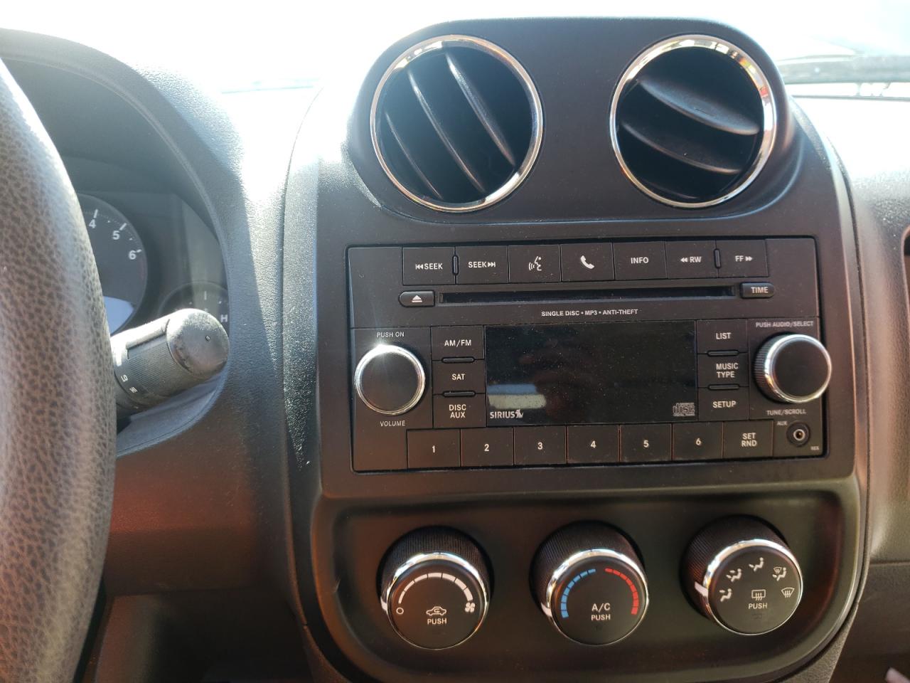 Photo 9 from auction – 2012 JEEP COMPASS SP with VIN 1C4NJCBA1CD627362