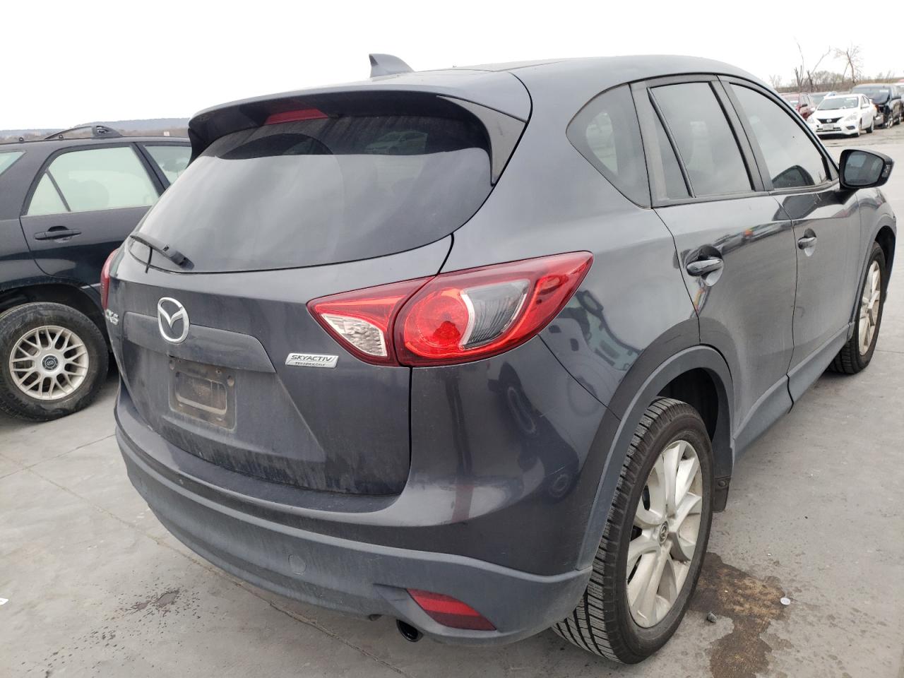 Photo 4 from auction – 2014 MAZDA CX-5 GT with VIN JM3KE2DY7E0302714