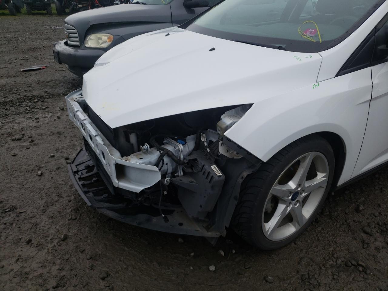 Photo 10 from auction – 2015 FORD FOCUS S with VIN 1FADP3E27FL375731