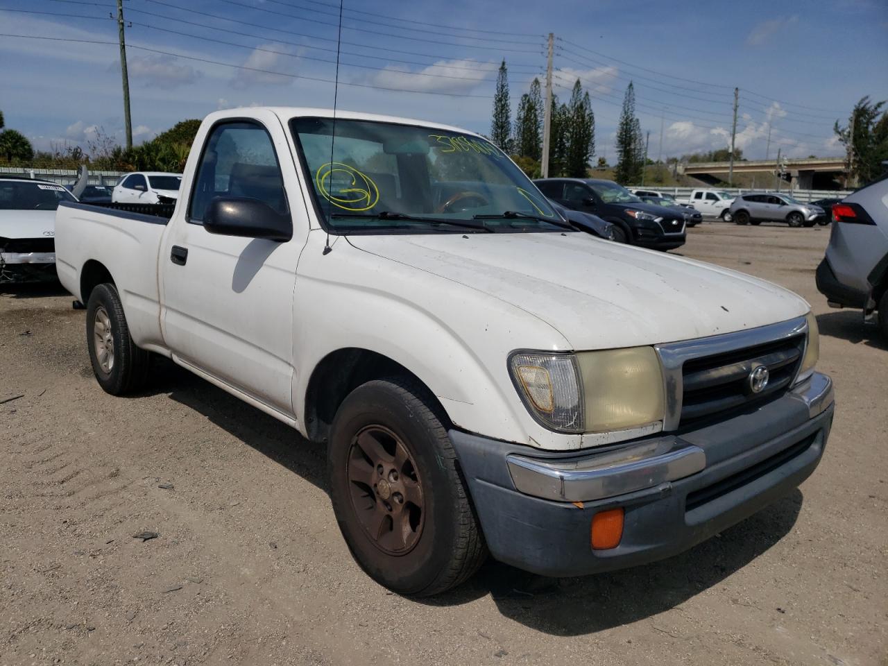 TOYOTA TACOMA 2000 with VIN 4TANL42N2YZ661688 - Photo from auction