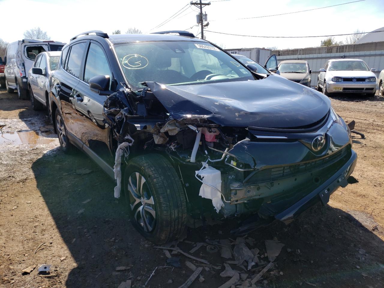 TOYOTA RAV4 LE 2018 with VIN 2T3BFREV7JW828334 - Photo from auction
