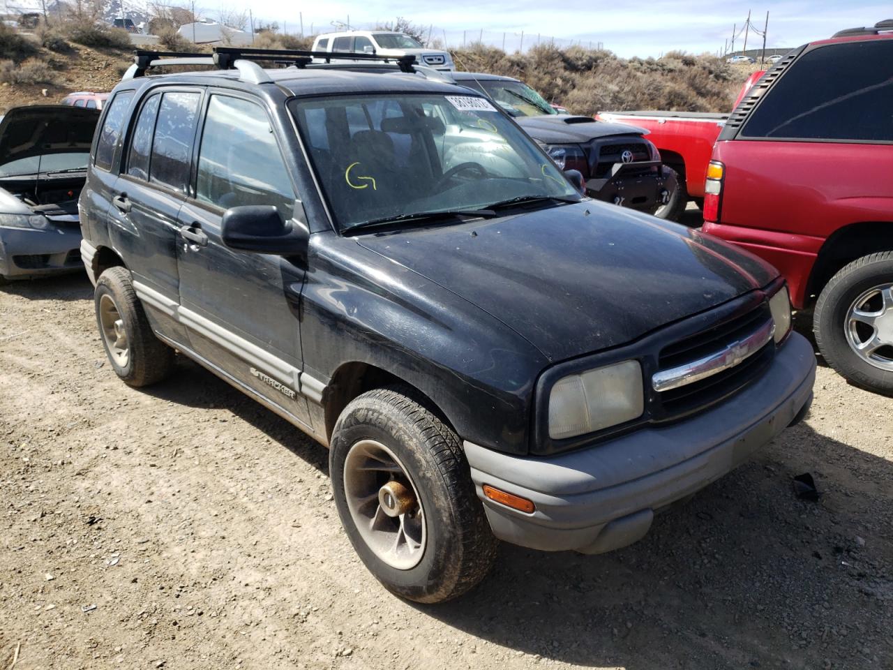 Photo 11 from auction – 2000 CHEVROLET TRACKER with VIN 2CNBJ13C0Y6908710