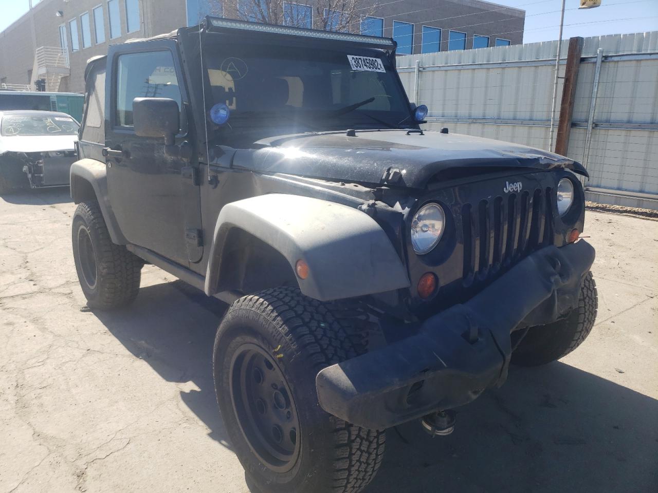 JEEP WRANGLER R 2011 with VIN 1J4BA6D14BL543990 - Photo from auction