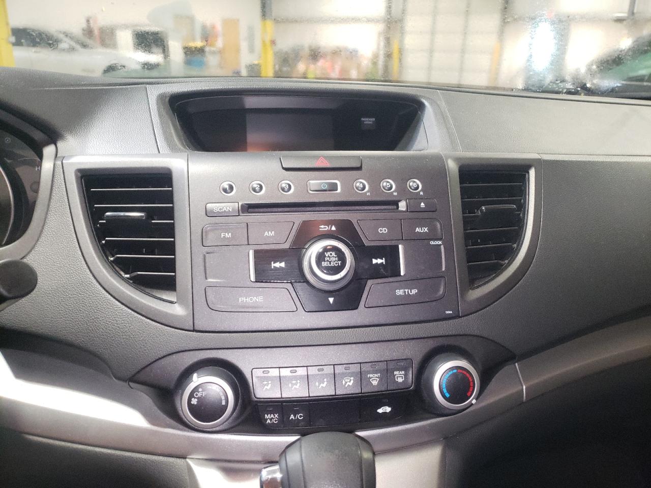 Photo 9 from auction – 2014 HONDA CR-V LX with VIN 2HKRM4H37EH679678